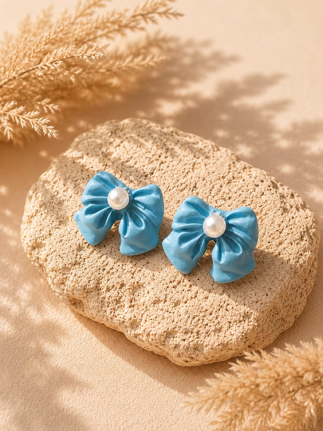 handmade clay patel ribbon studs handmade clay patel ribbon studs
