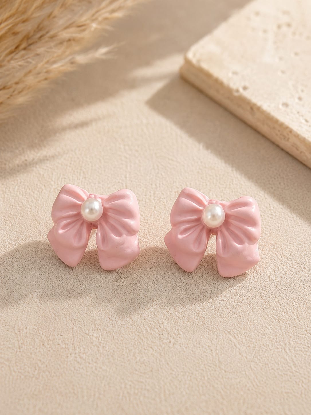 handmade clay pink bow studs handmade clay pink bow studs
